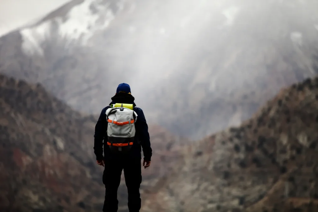 Person looking at the mountains
